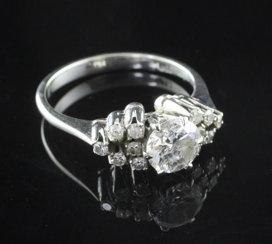 An 18ct white gold and diamond cluster ring, size P.